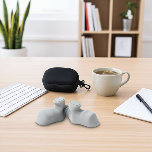 Grip Strengthener Spring Grip grey silicone pads and black carry case on wooden desk – portable hand exerciser for office and gym use